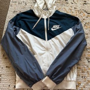 Navy blue and white Nike windbreaker